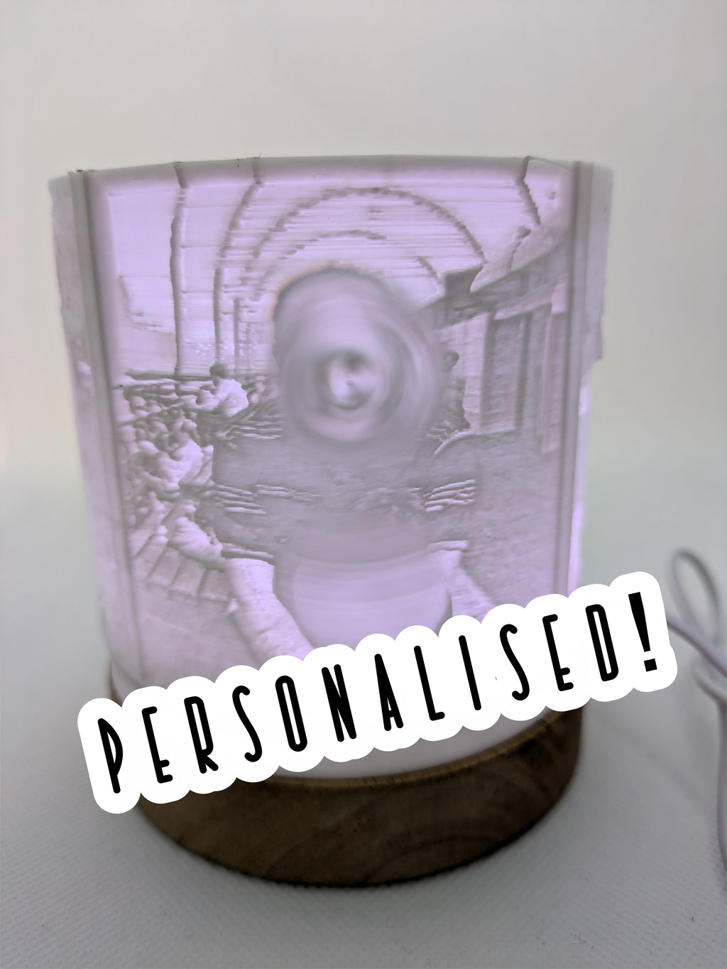 Personalised lamp with a printed design on a white background
